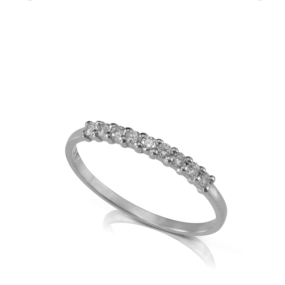 Ring with a row of diamonds in a prominent setting