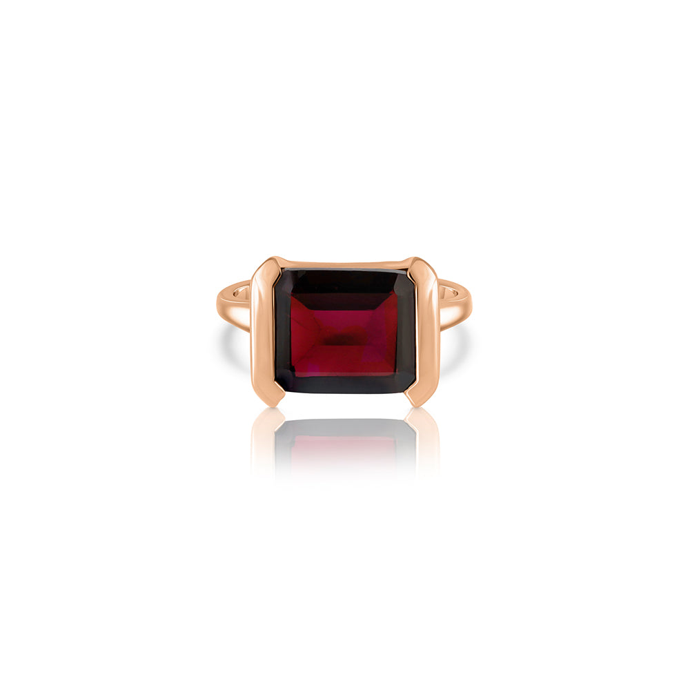 An impressive emerald cut garnet ring