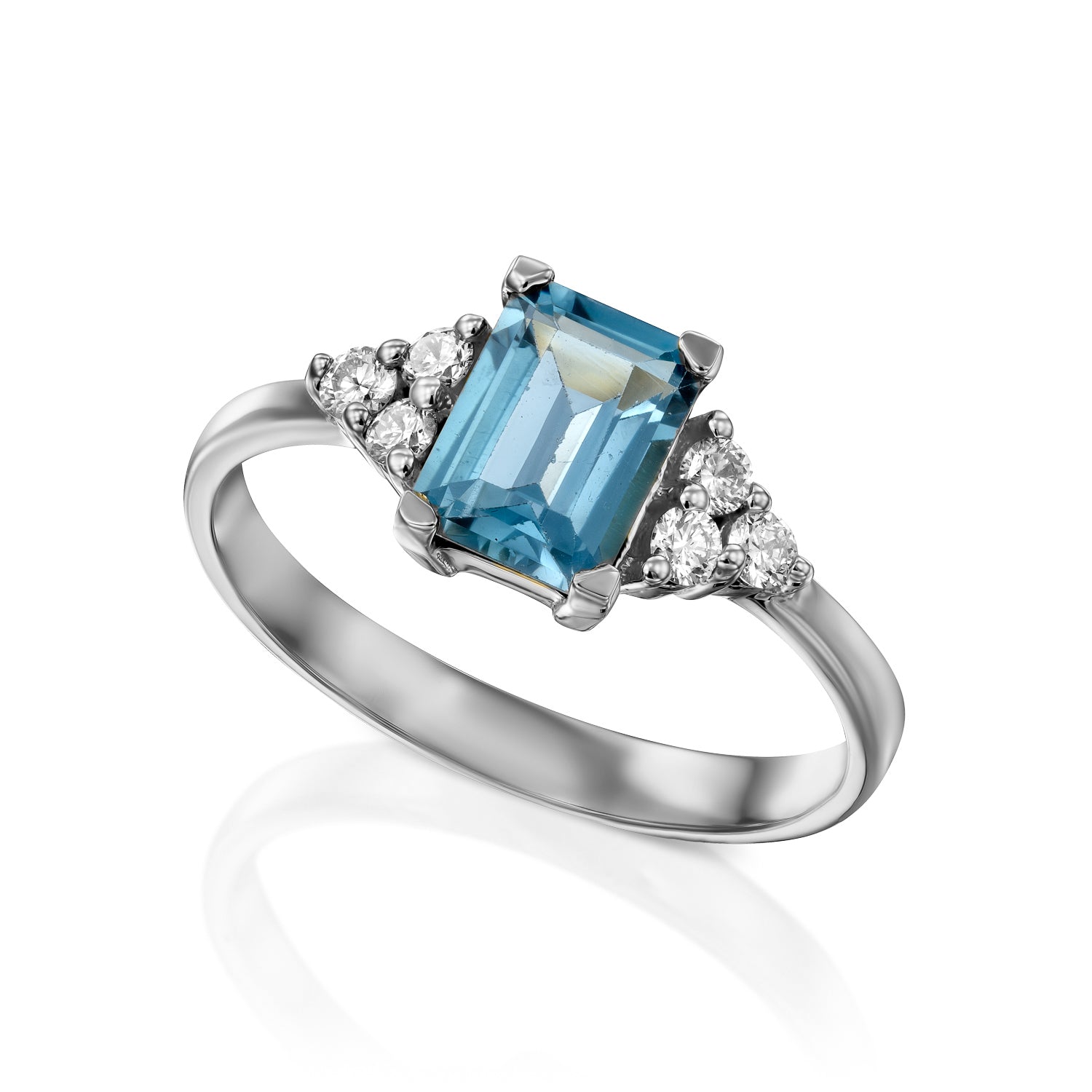 An engagement ring set with rectangular London blue topaz and 6 sided diamonds