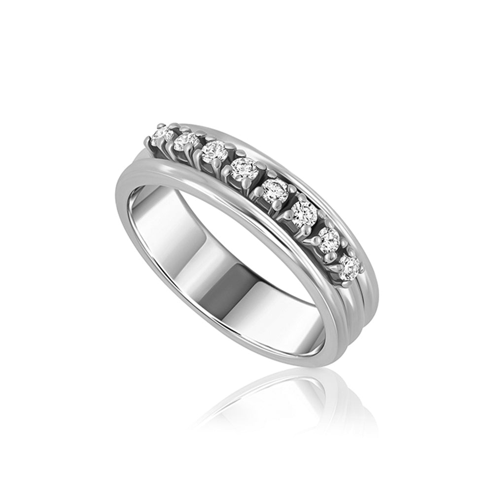 A wide gold ring set with 9 laboratory diamonds