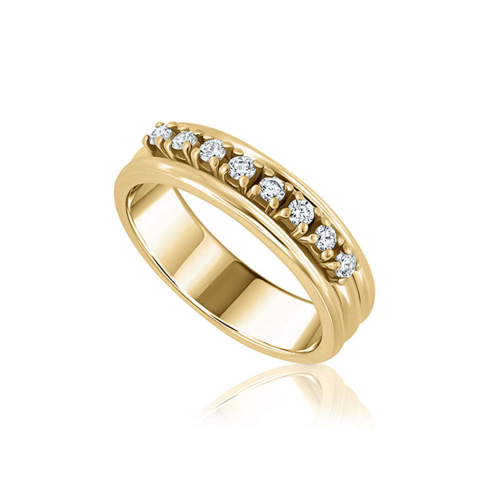 A wide gold ring set with 9 laboratory diamonds