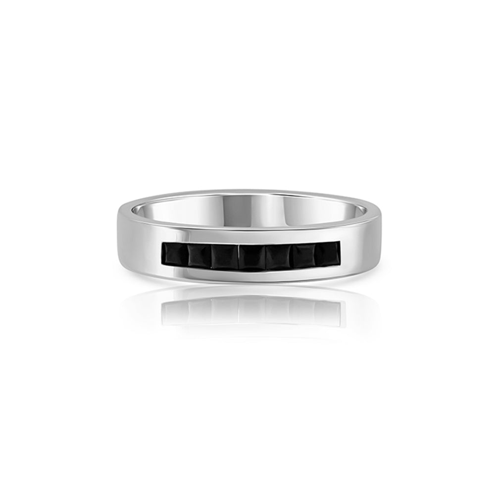 A wide gold ring for men inlaid with onyx in a line princess cut