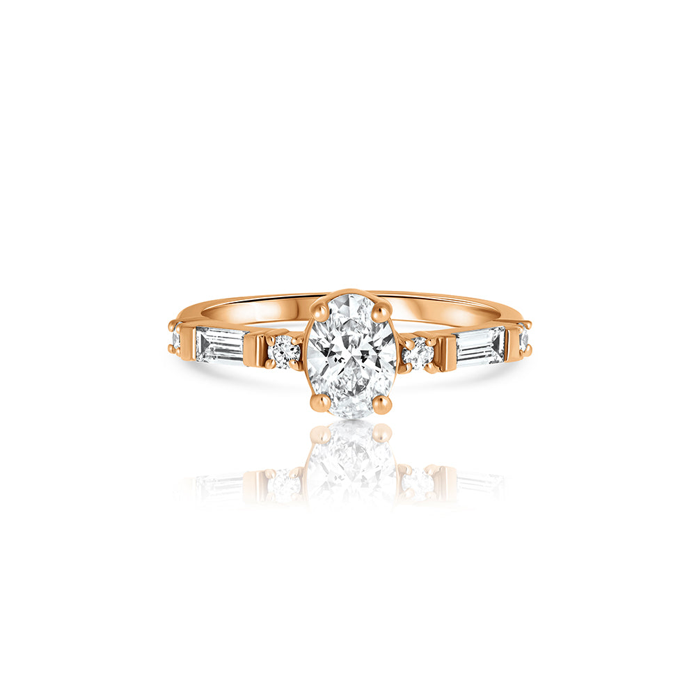 Engagement ring set with laboratory diamonds, central oval stone 0.70ct and baguette and side round diamonds