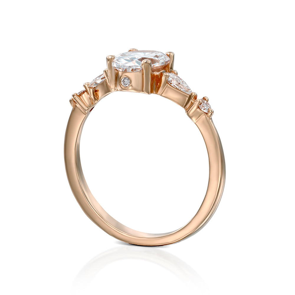 1.00 carat diamond ring combined with drop cut diamonds and round diamonds