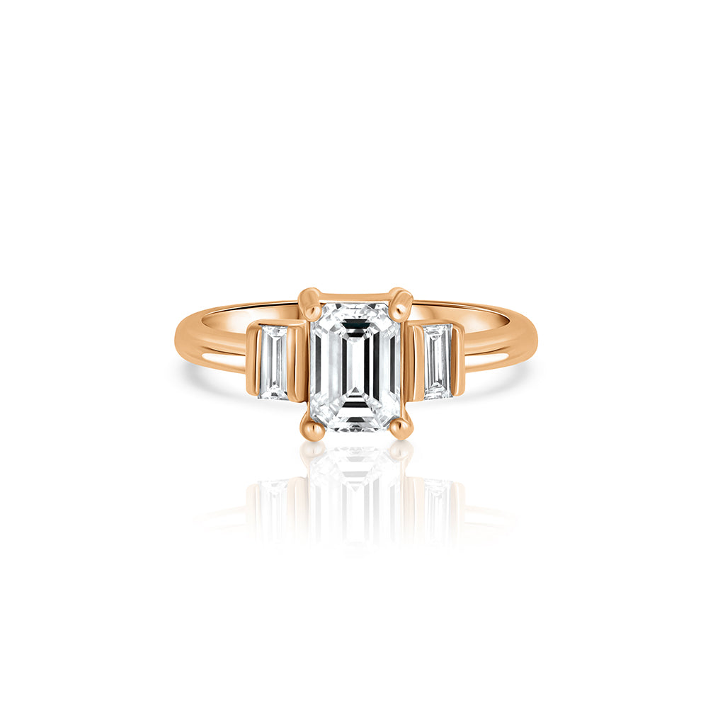 A modern gold engagement ring set with laboratory diamonds