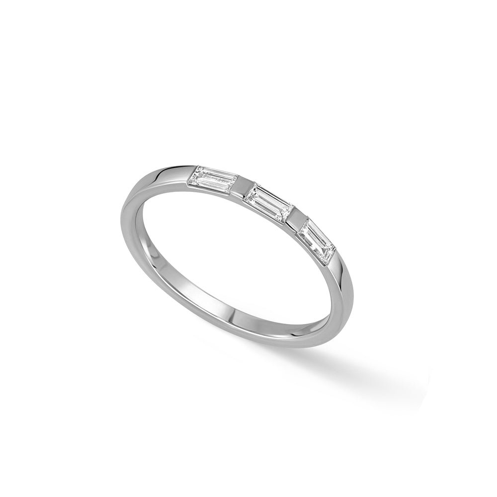 Thin flat gold ring set with 3 baguette-cut laboratory diamonds