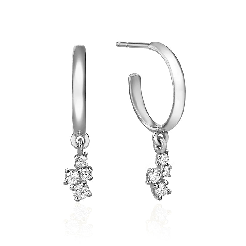 Gold hoop earrings with diamonds of varying sizes