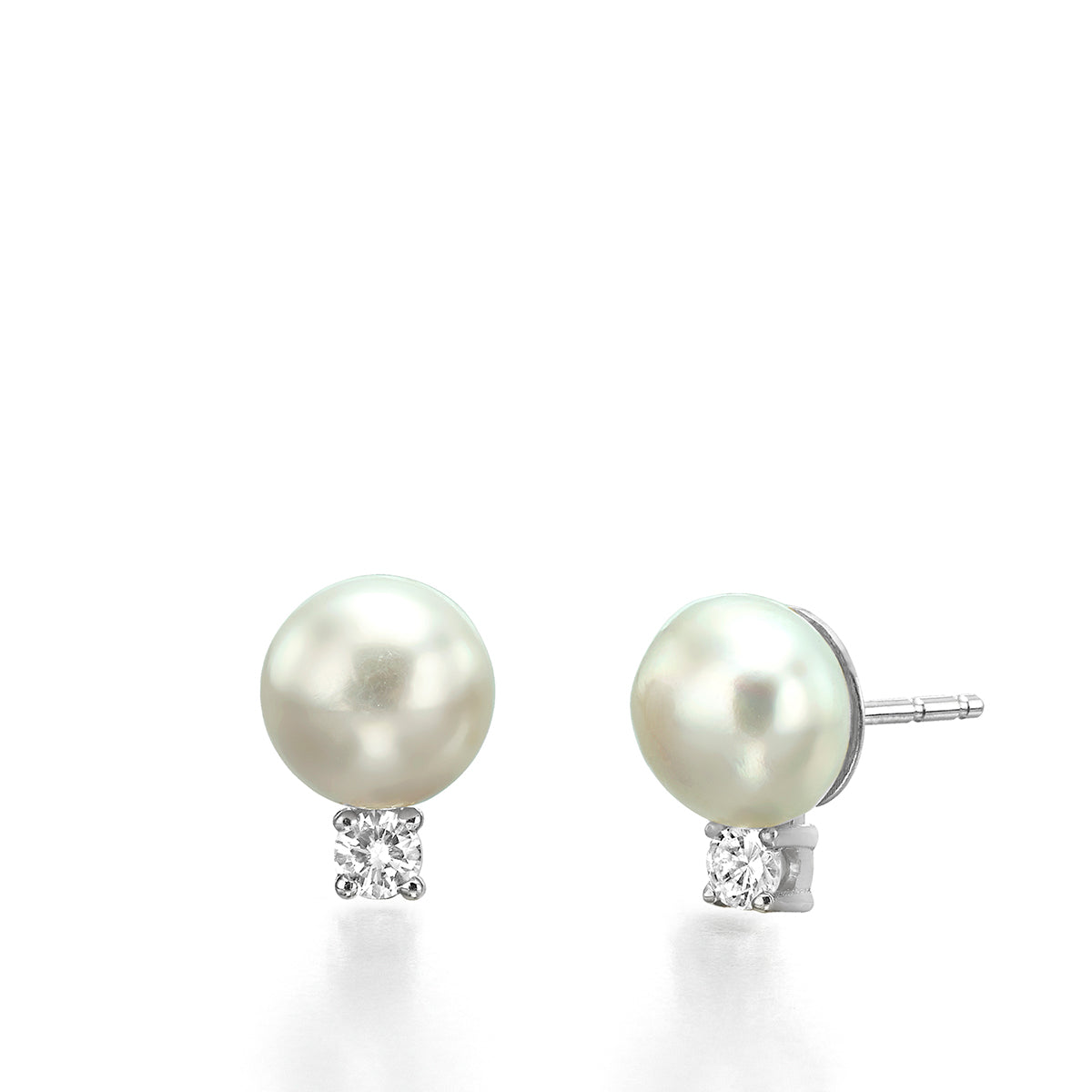 Large attached pearl and diamond earrings