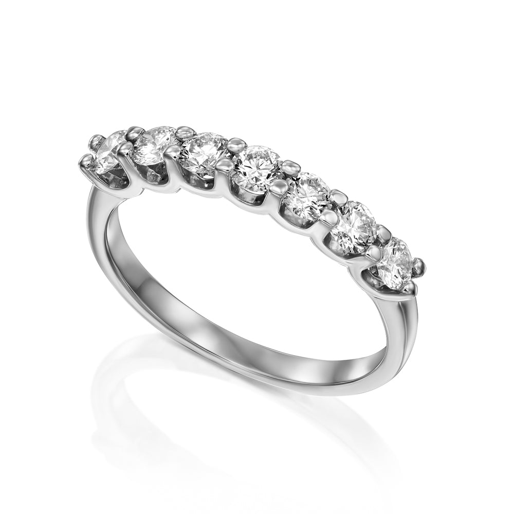 Gold ring with 7 diamonds weighing 10 points per diamond
