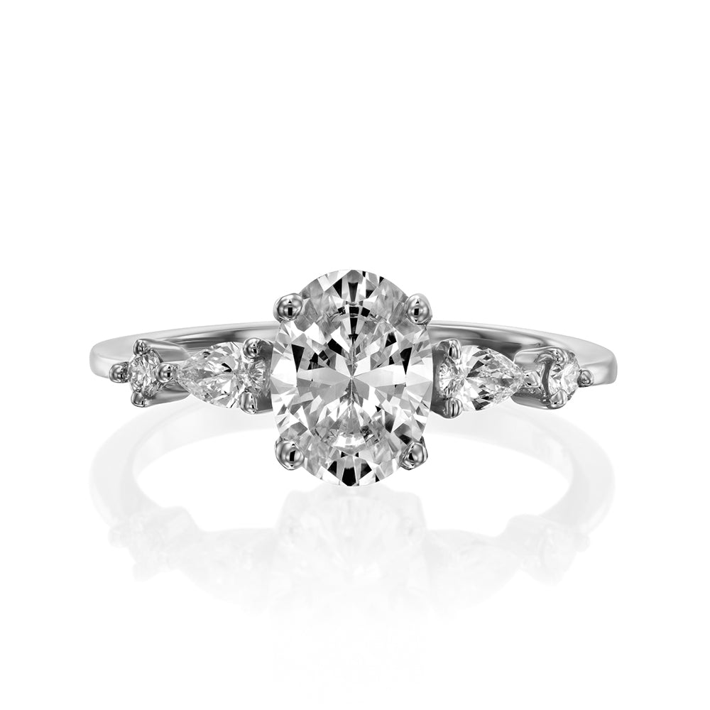 1.00 carat diamond ring combined with drop cut diamonds and round diamonds