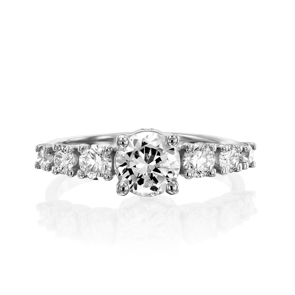 Engagement ring set with a central round diamond 0.90ct and 6 side diamonds