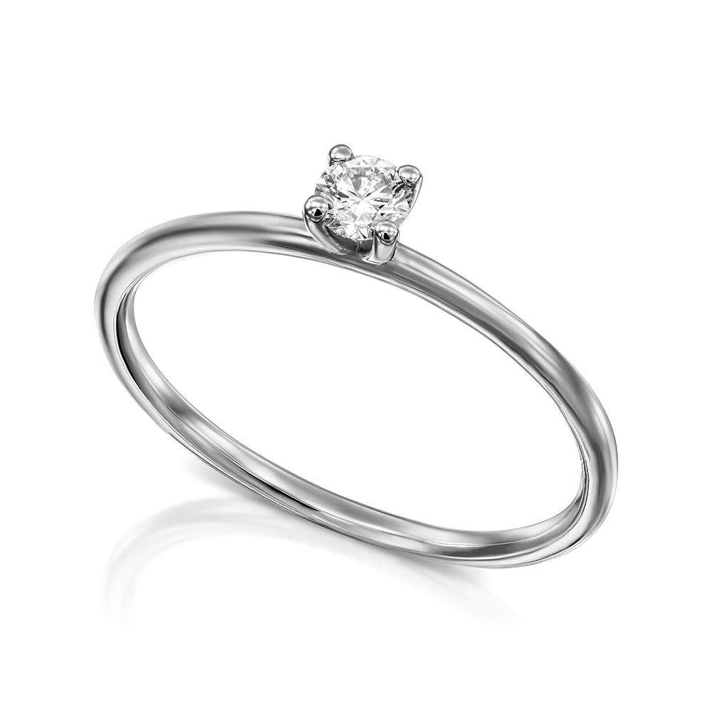 Delicate engagement ring set with a round diamond 15 points round profile