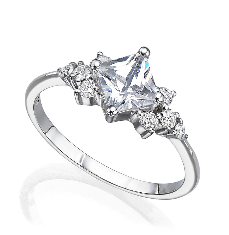 Engagement ring set with a princess diamond and round diamonds
