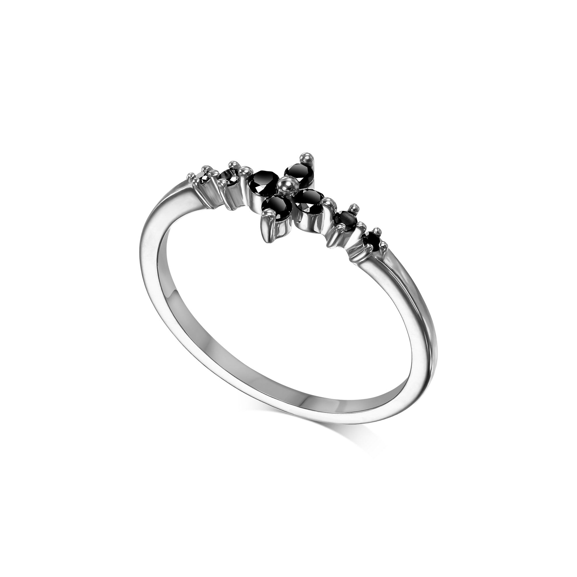 A delicate and thin gold ring set with black diamonds in the shape of a central flower and side diamonds