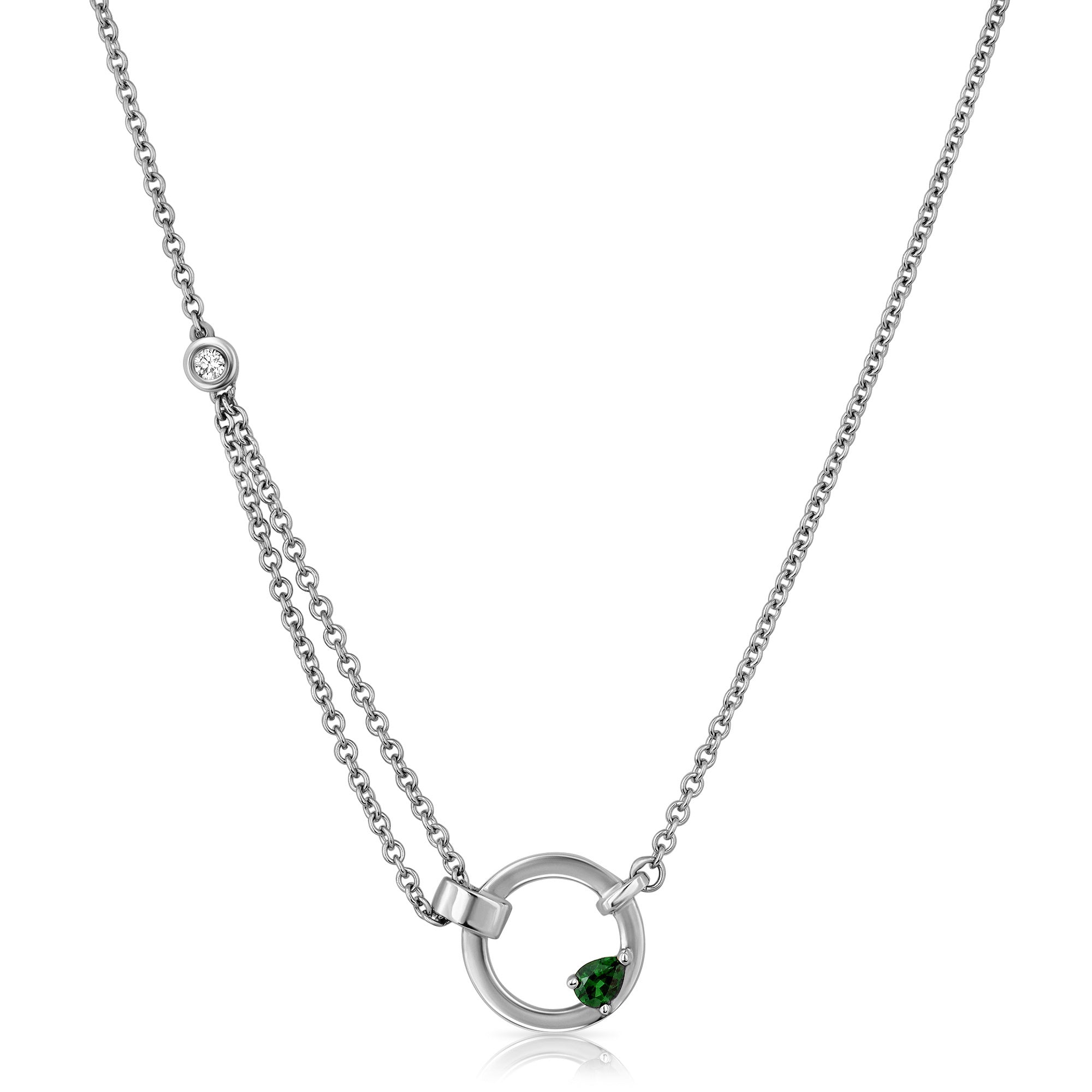 A thick, asymmetric and special gold chain, with a modern and impressive design. Set with tourmaline and diamond