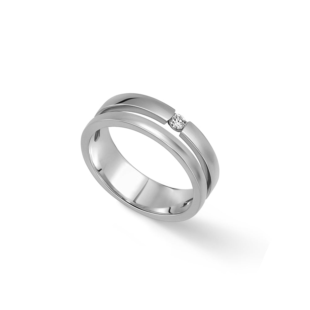 A double gold ring set with a round diamond weighing 5 points
