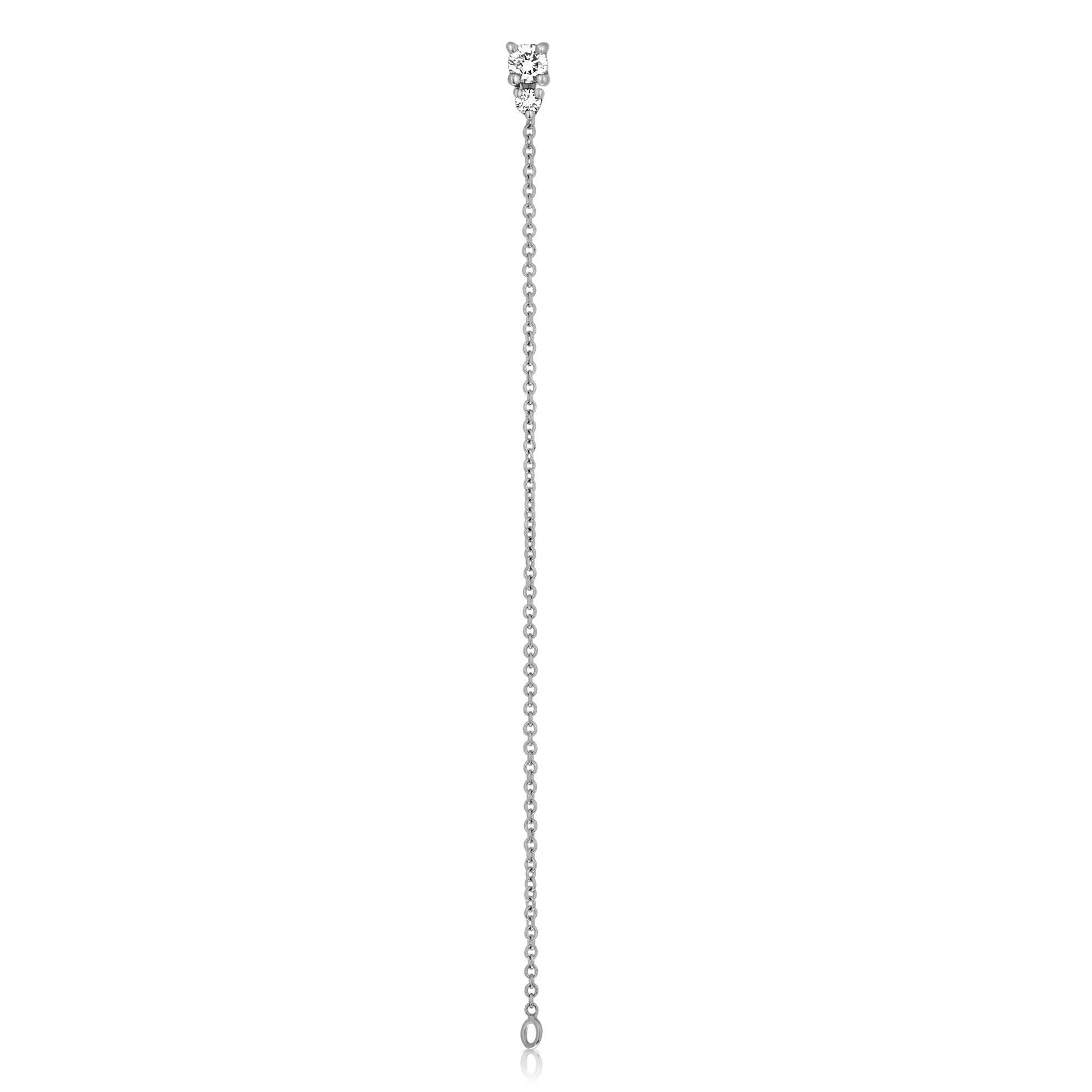 A special gold chain earring studded with laboratory diamonds