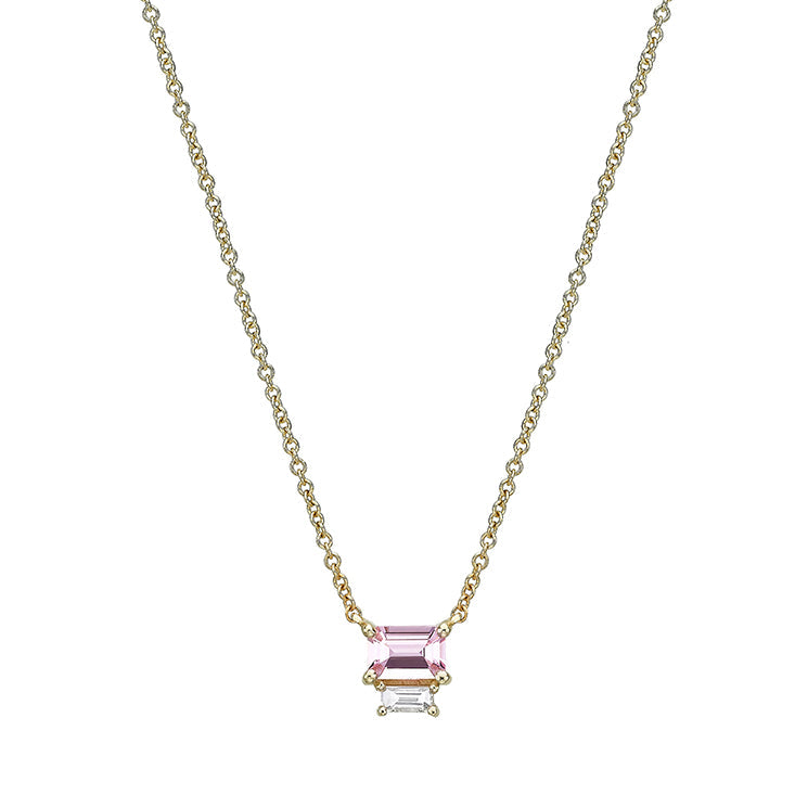Gold necklace with pendant inlaid with emerald cut emeraldcut and baguette diamond