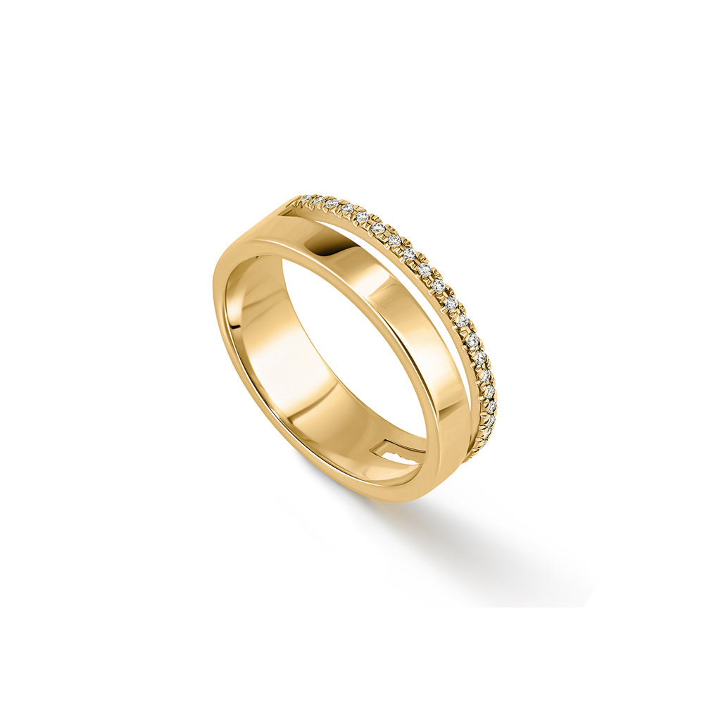 A double gold ring set with a row of diamonds and a smooth wide band