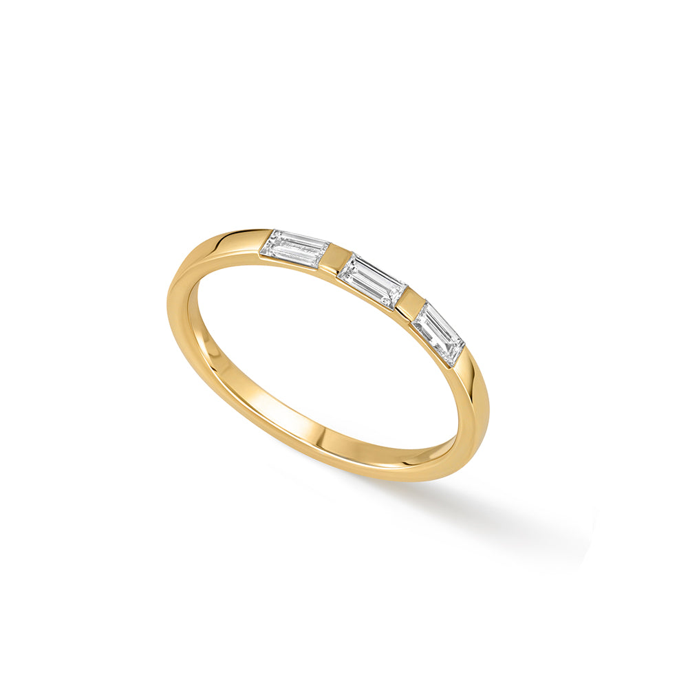 Thin flat gold ring set with 3 baguette-cut laboratory diamonds