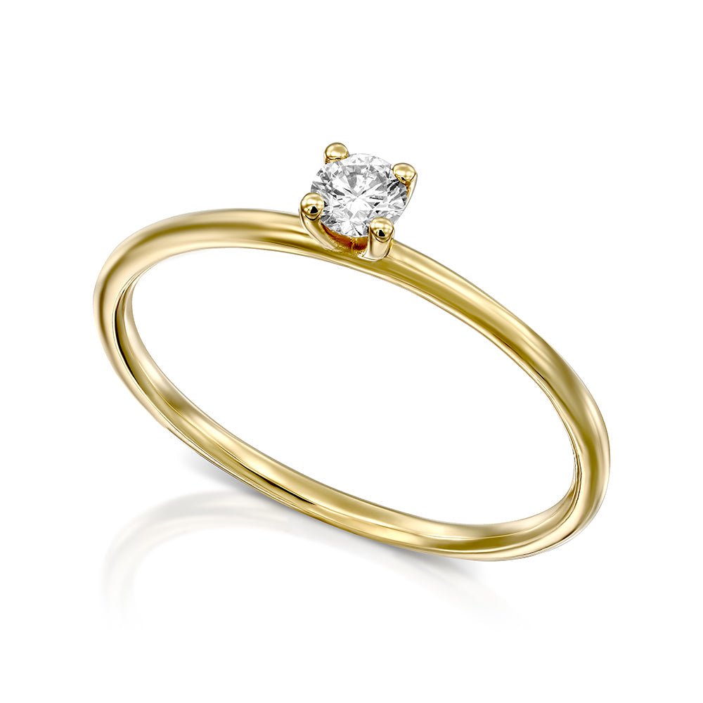 Delicate engagement ring set with a round diamond 15 points round profile