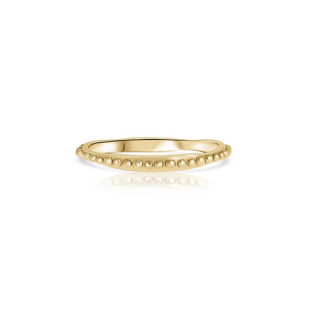 Asymmetric wedding ring decorated with a gold ball