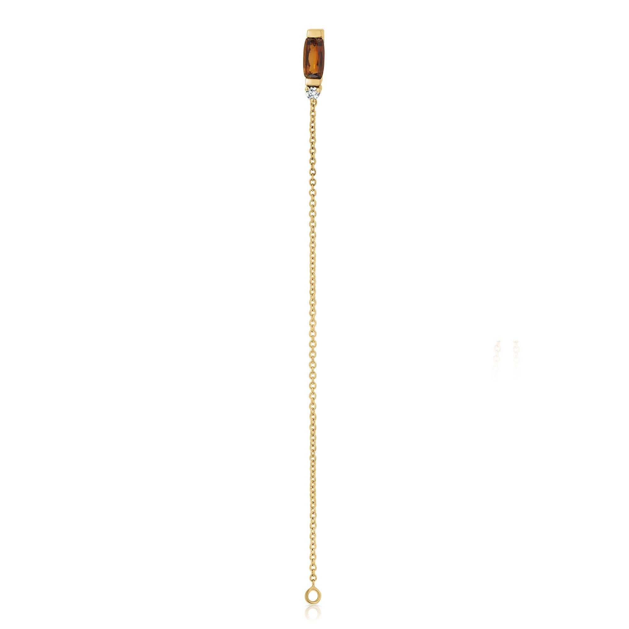 A special gold chain earring studded with gemstone, tourmaline and diamond