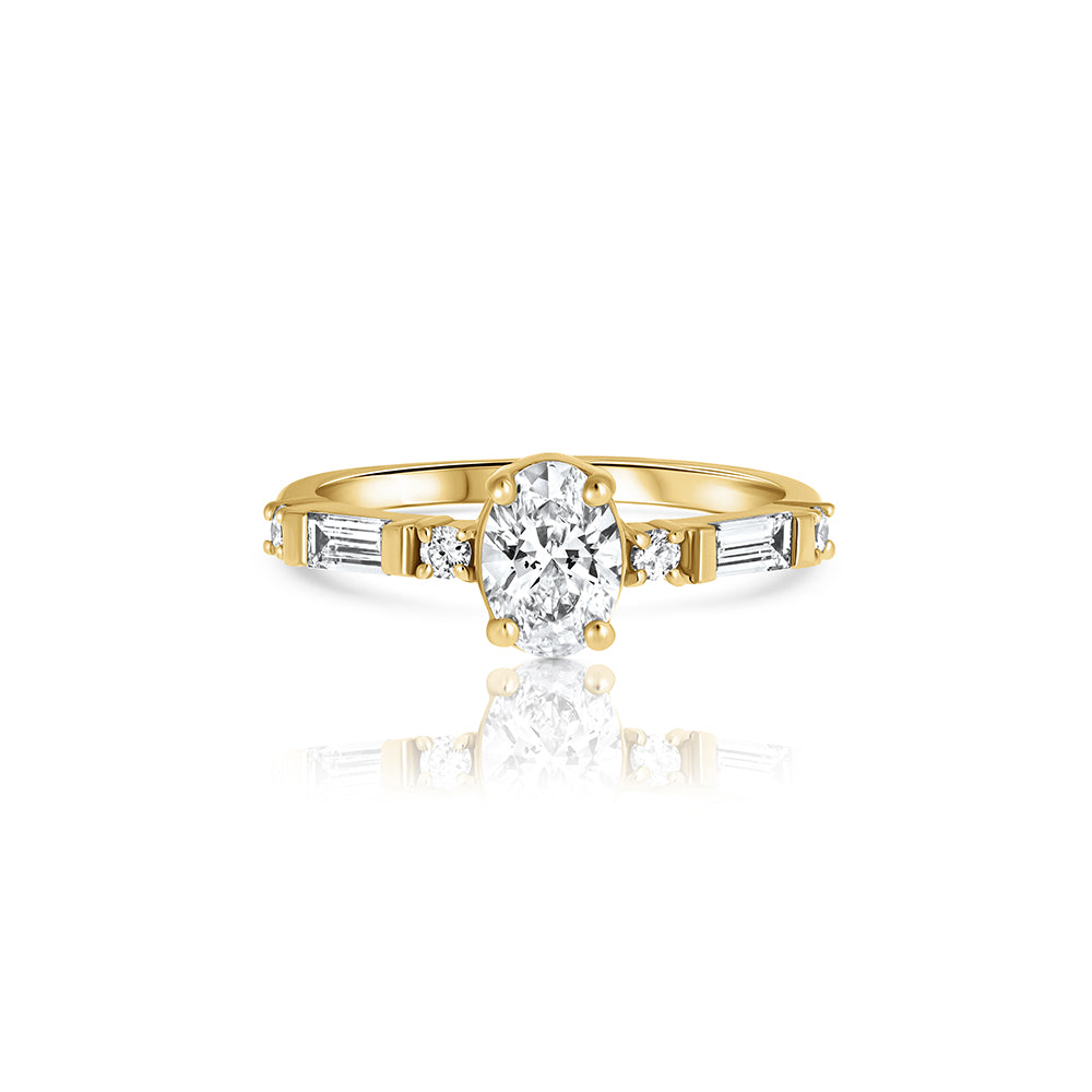 Engagement ring set with laboratory diamonds, central oval stone 0.70ct and baguette and side round diamonds