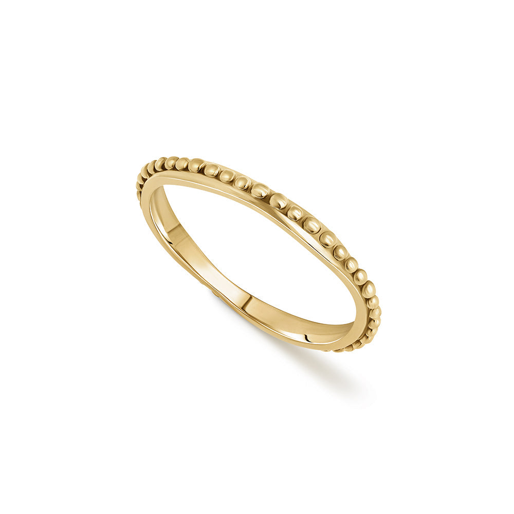 Asymmetric wedding ring decorated with a gold ball