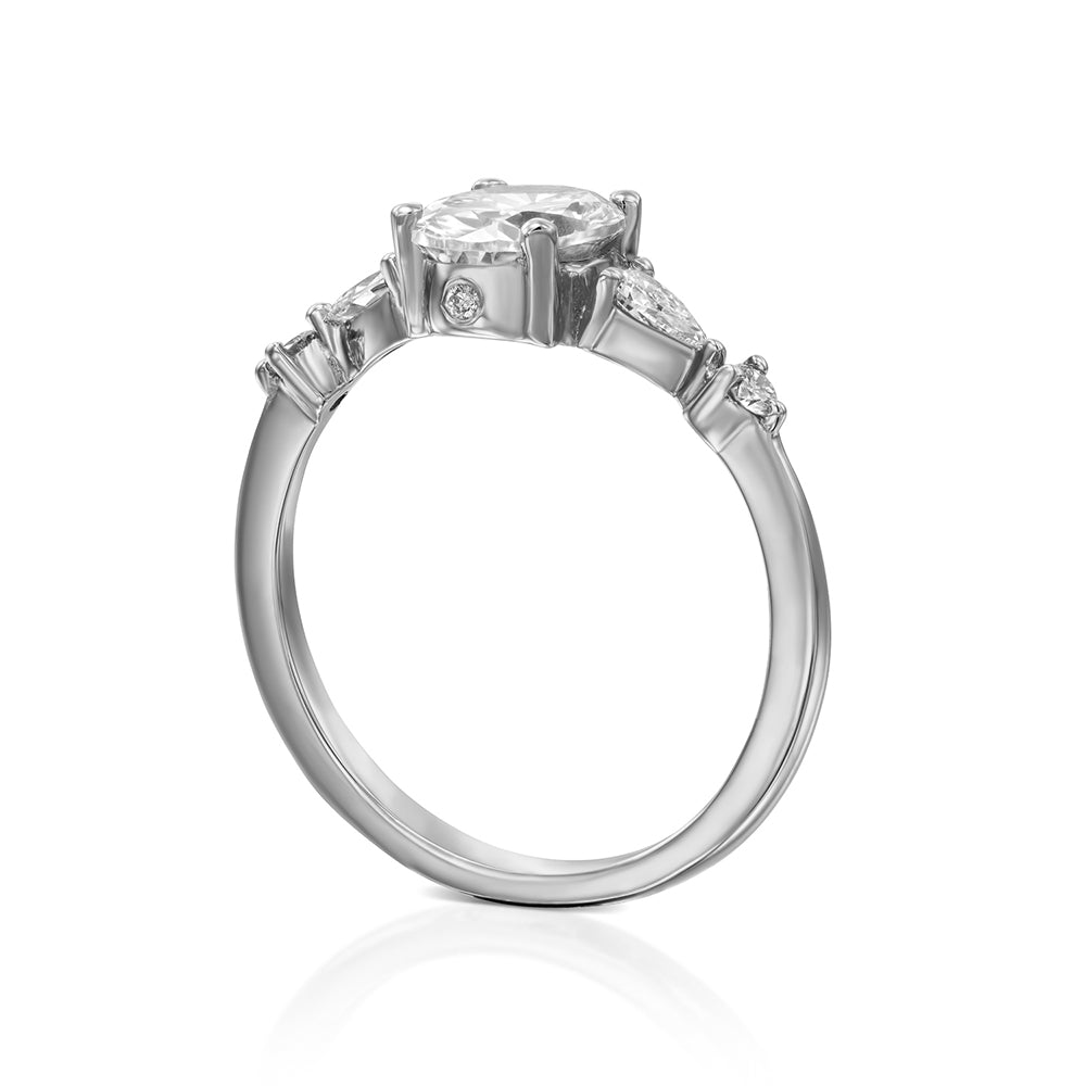 1.00 carat diamond ring combined with drop cut diamonds and round diamonds