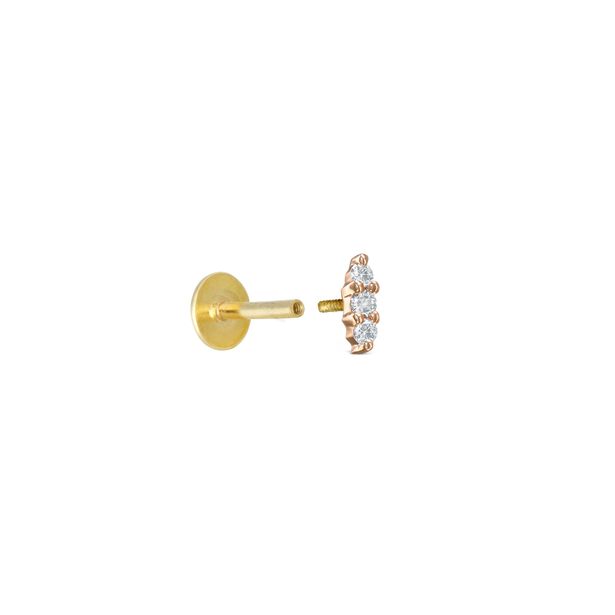 The special gold helix / tragus combined with a band studded with 3 diamonds