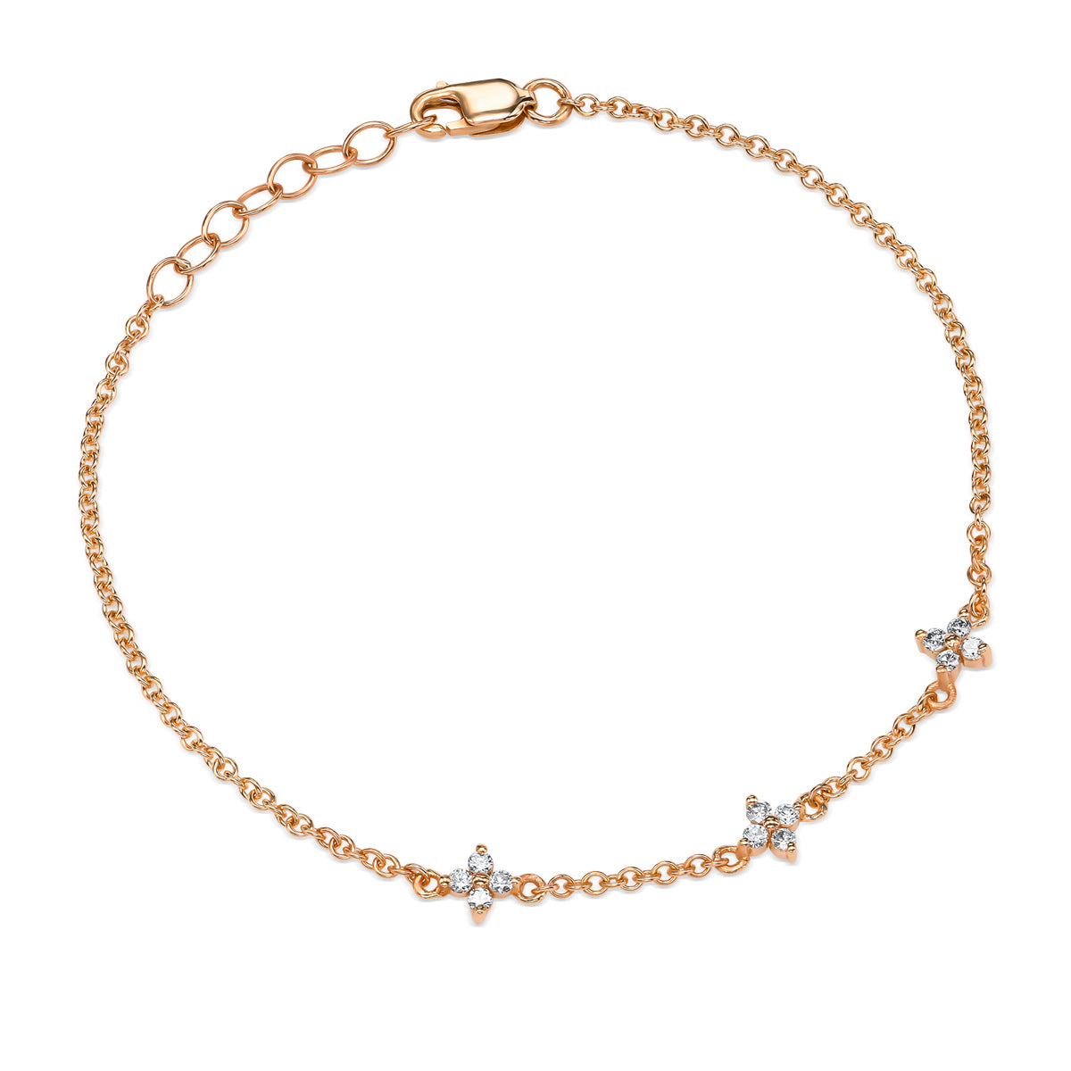Gold bracelet decorated with 3 pendants in the shape of a flower and white diamonds