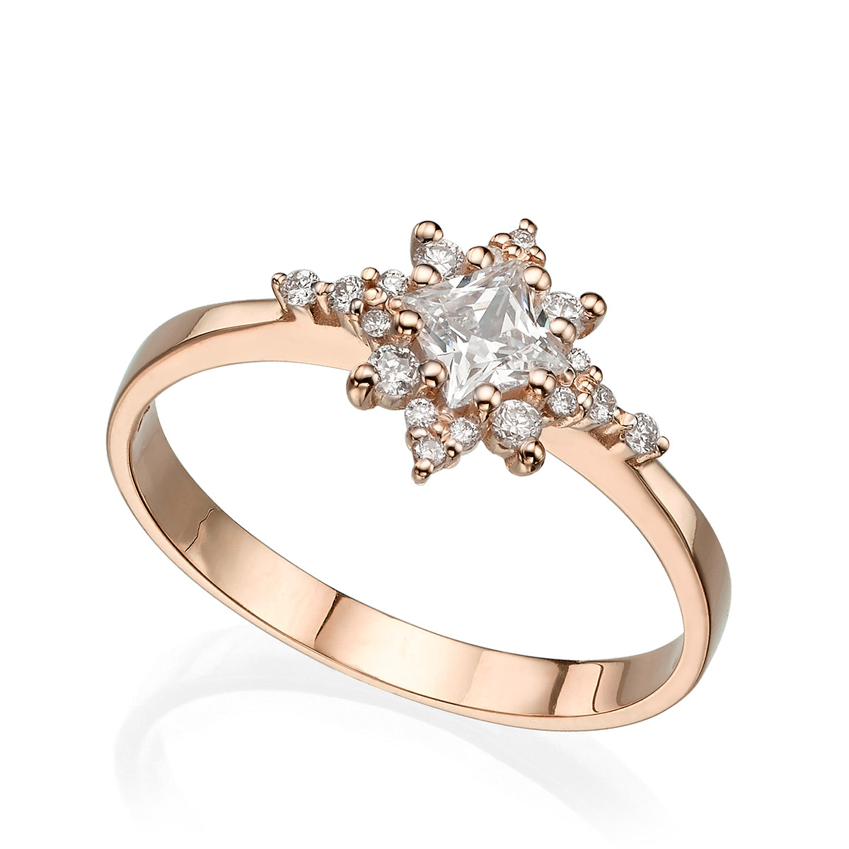 A diamond star ring with a central brilliant cut diamond