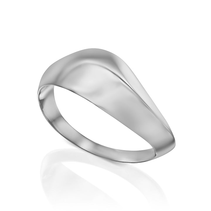 A wide geometric gold ring in a wave shape
